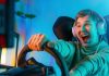 Pro Gamer Man playing computer games. Car Racing Online Video Game