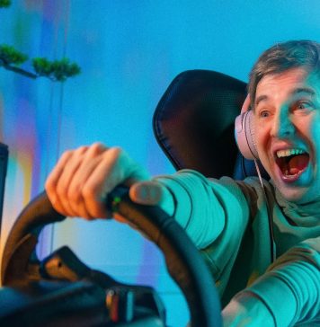 Pro Gamer Man playing computer games. Car Racing Online Video Game