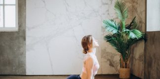 Yoga poses help ease chronic pain. (Photo via Pexels/Elina Fairytale)
