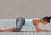 Woman performing frog pose for hip flexor pain