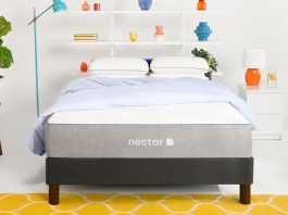 The Nectar Essential Hybrid mattress in a bedroom