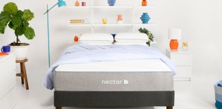 The Nectar Essential Hybrid mattress in a bedroom